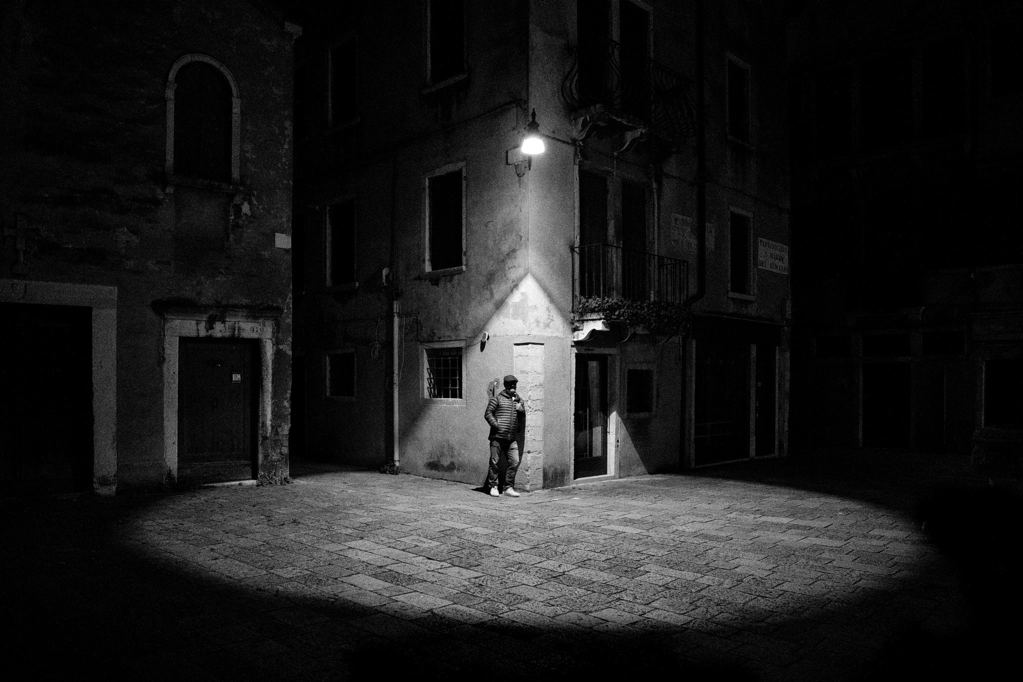 a dark alley at night in Venice